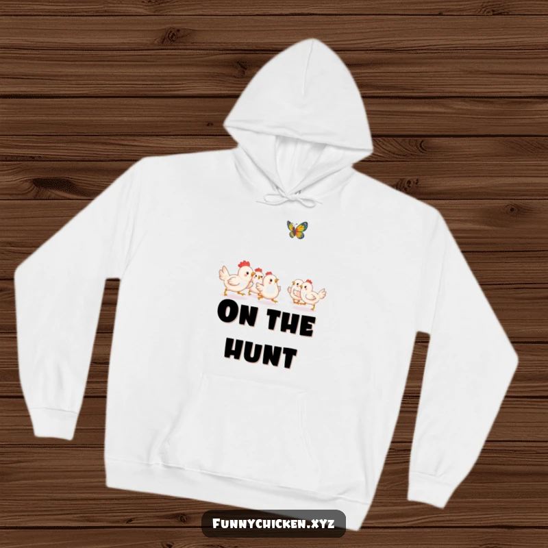 Funny Kawaii chicken hoodie, depicting a group of chickens playfully chasing a fluttering butterfly in a spirited pursuit.